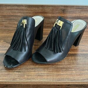 High heel leather mules with gold detail